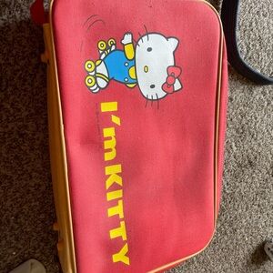 Hello Kitty Red and Yellow Bag with Blue Outfit Graphic